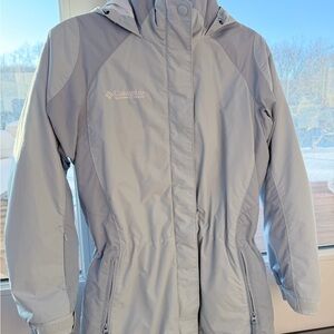 Columbia Women's Small Lt Blue Ski Jacket. Fully Adjustable at Hood Waist & Hem